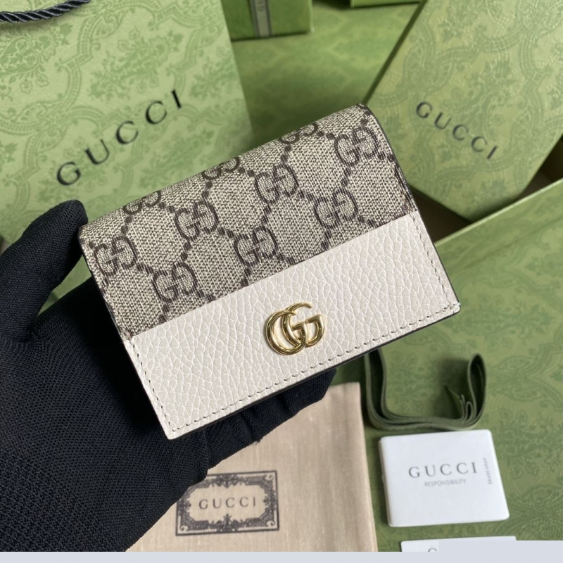 G*u*i wallets & purse